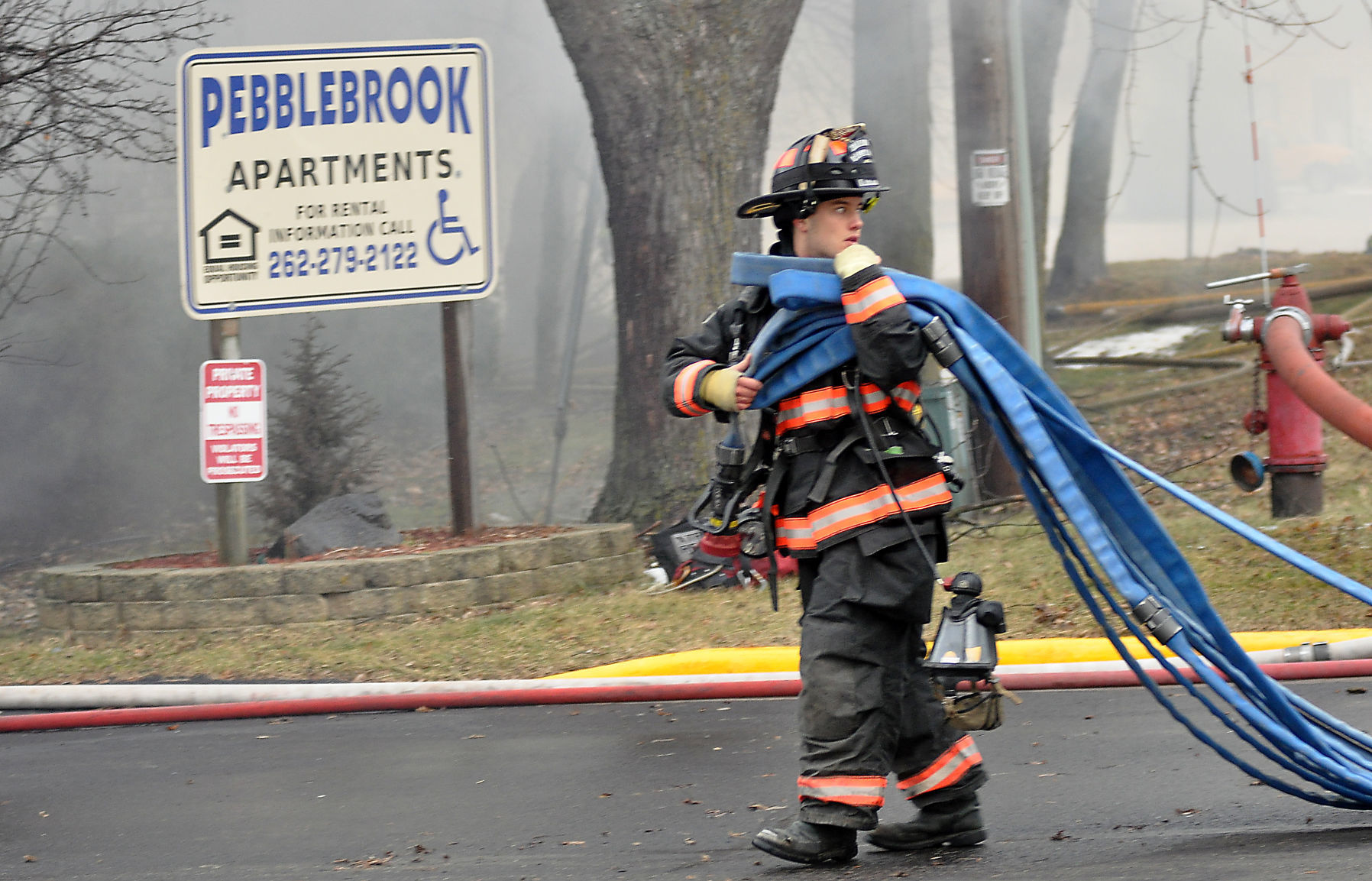 Firefighter battling blaze at Pebblebrook Apartments